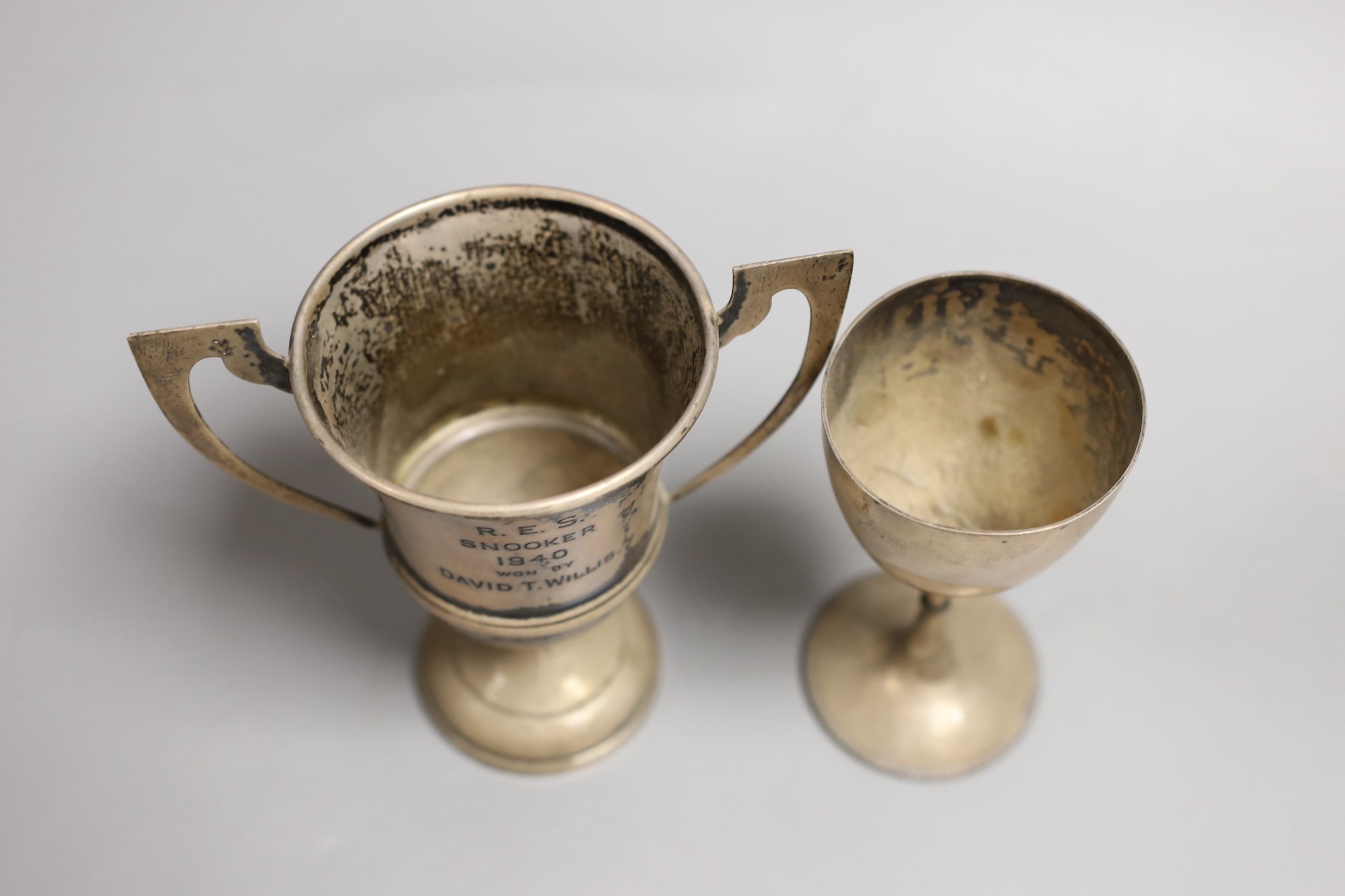 A Victorian silver goblet, by Daniel & Charles Houle, London, 1869, 11.5cm and a later two handled small cup, 6.1oz.